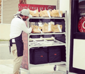 Man delivering food for curbside takeout